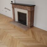 photographie-apres-travaux-du-parquet-en-bois-massif-et-de-l-entourage-de-la-cheminee-de-la-rue-jean-jaures